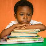 Photo supporting a child with difficulties at school