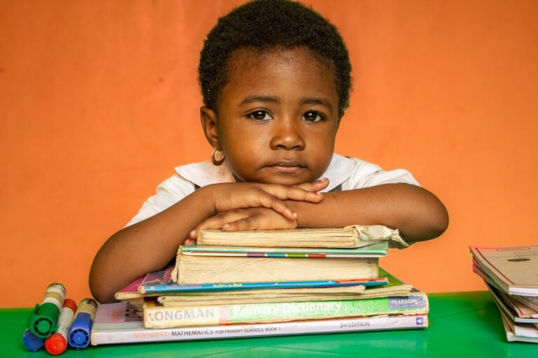 Photo supporting a child with difficulties at school